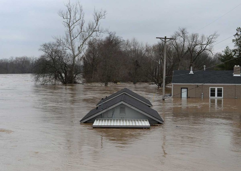 At least four die as floods hit US south, thousands of homes damaged