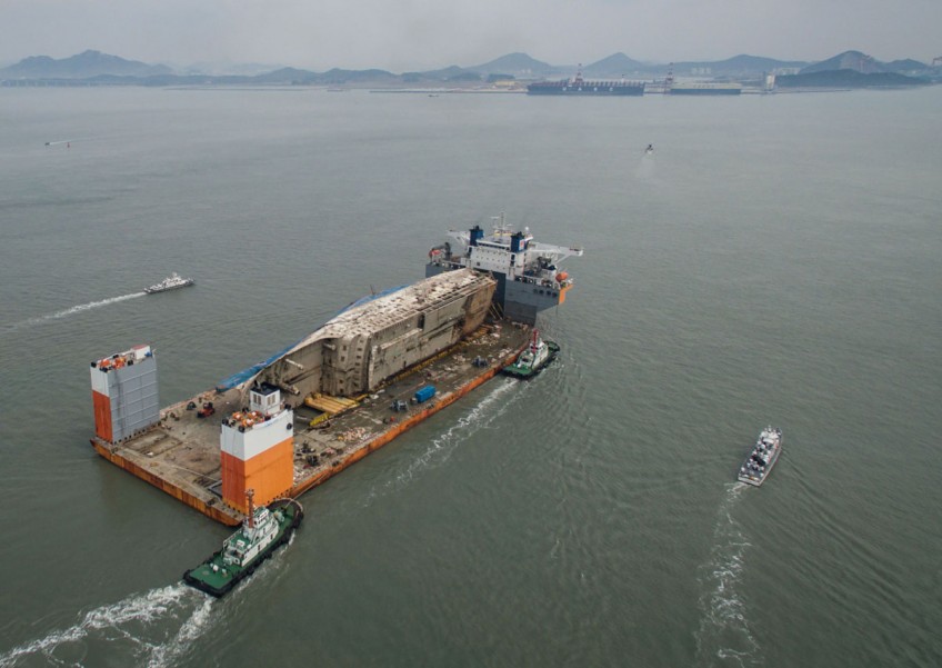 S Korea's sunken Sewol ferry reaches port at last