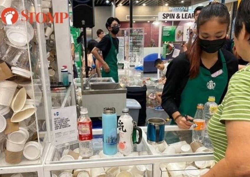 Free Starbucks coffee: Woman brings 7 containers to NEA's 'bring your own tumbler' event