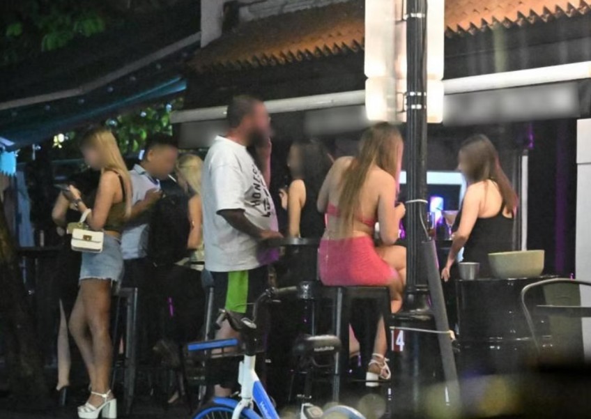 Russian, Ukrainian women allegedly working illegally in Boat Quay area selling 'special' drinks at $100 each