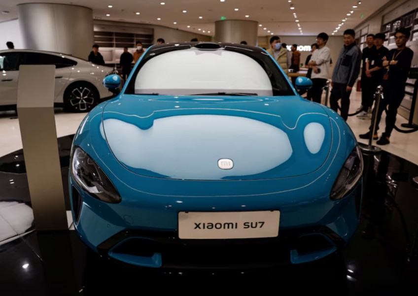 Xiaomi CEO teases price on upcoming car, showrooms begin displaying vehicle