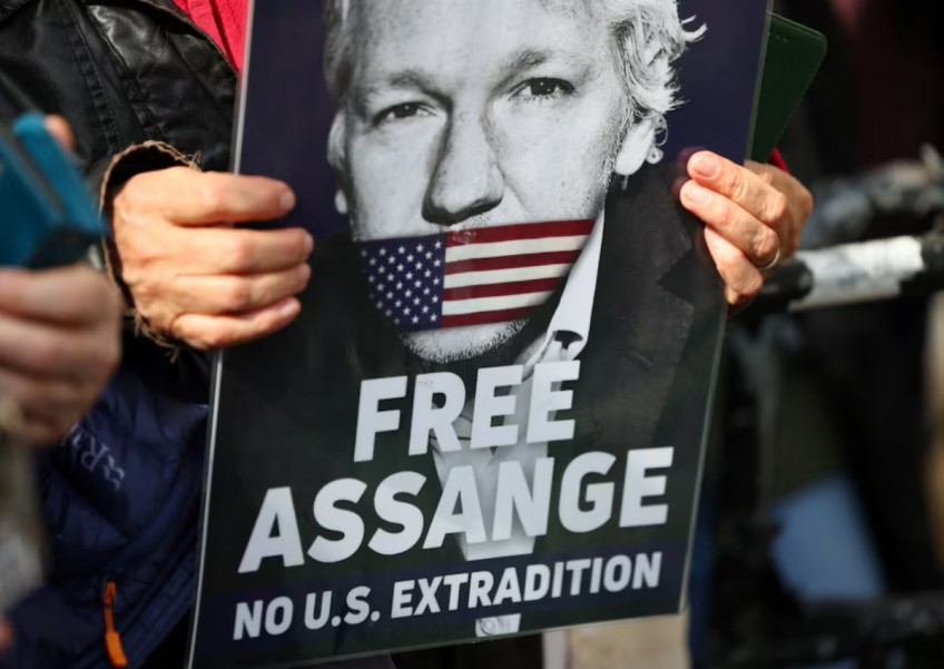 Julian Assange wins temporary reprieve from extradition to US
