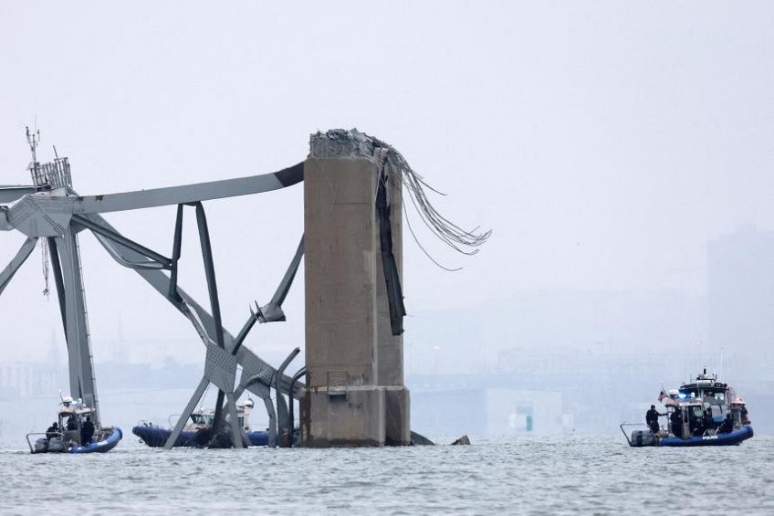 Divers recover 2 bodies from river after Baltimore bridge collapse