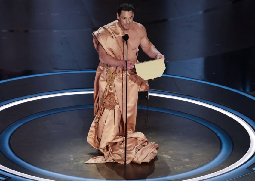 John Cena presents Oscars' Best Costume Design award naked with just an envelope to cover his modesty