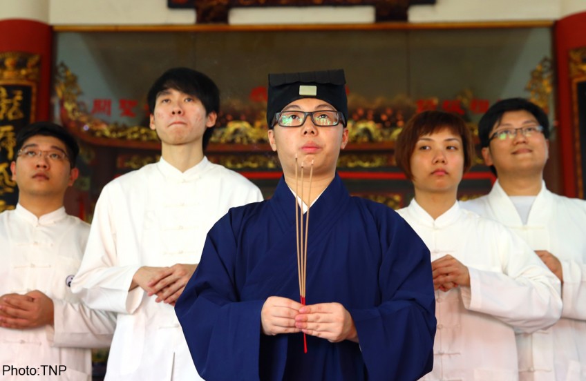 Young and faithful: 20-year-old ordained as Taoist priest 
