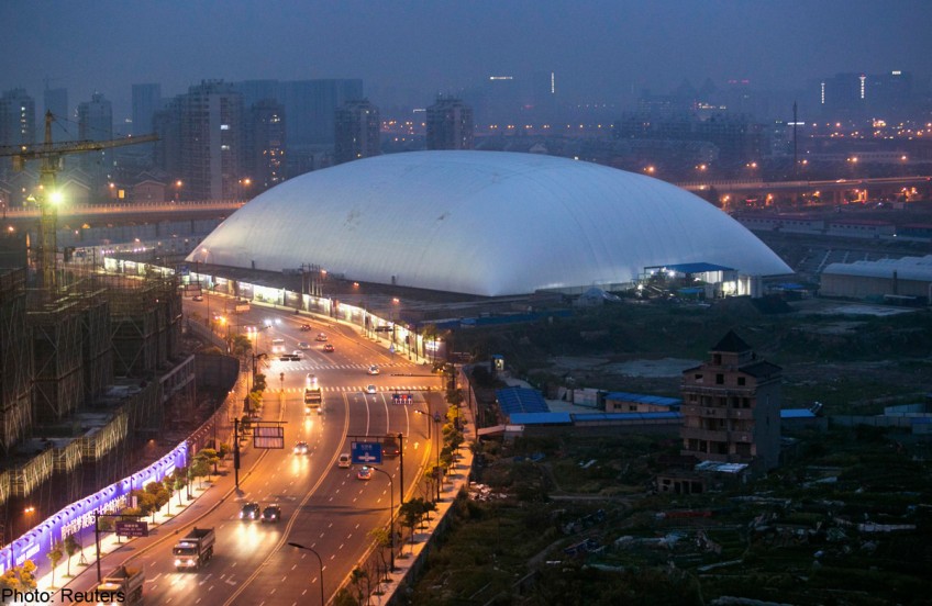 Chinese city erects giant dome over stinky former factory