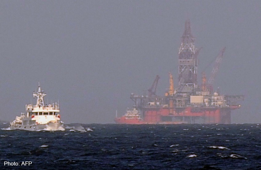 China oil rig finishes first phase of drilling in waters claimed by Vietnam