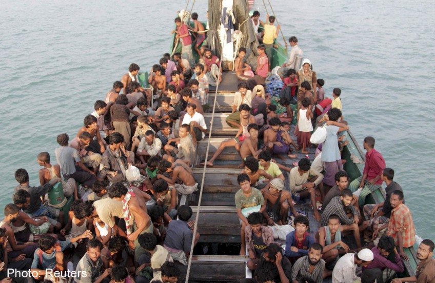 Myanmar navy finds 727 migrants packed in boat: Ministry