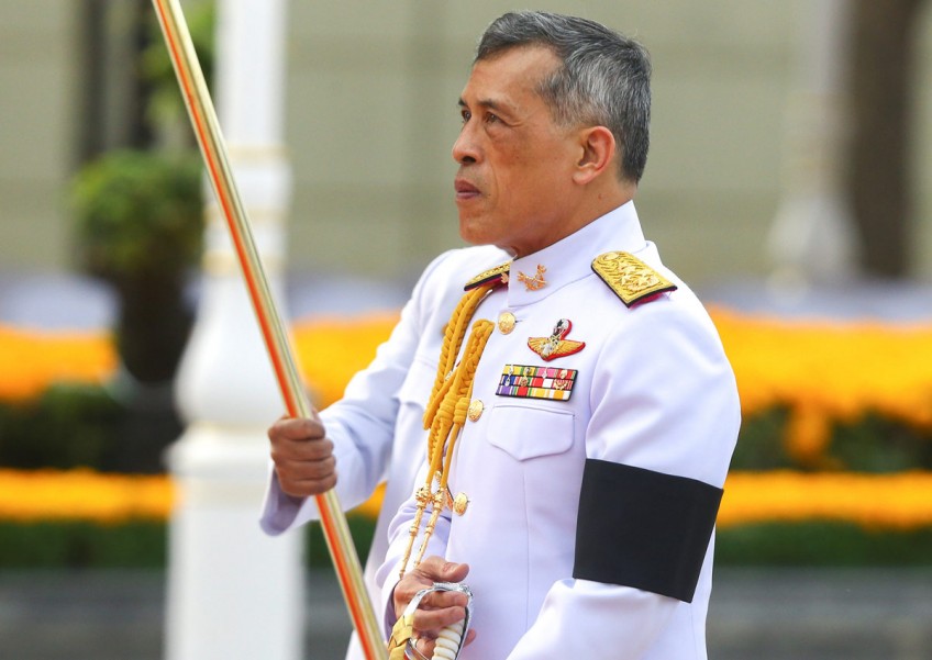 Thailand's new king watches as sacred oxen predict good harvest