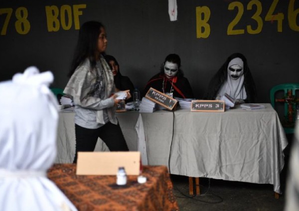 Indonesia votes: Ghosts and vampires draw voters to ballot box