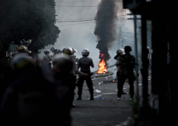 Indonesian police arrest at least 20 amid post-election violence