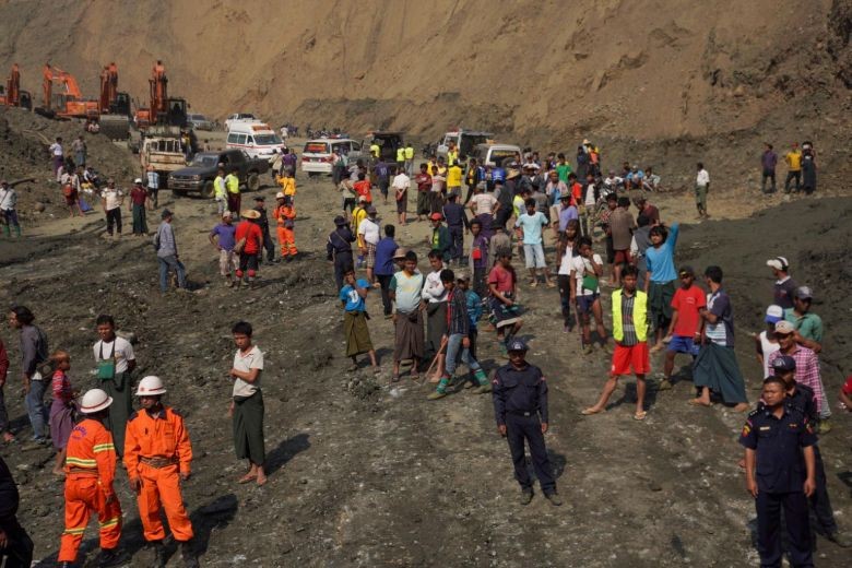 Rescuers battle to find bodies in Myanmar mudslide that engulfed more than 50 jade miners