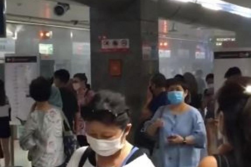Power bank catches fire on a train, all commuters disembark at Somerset MRT station