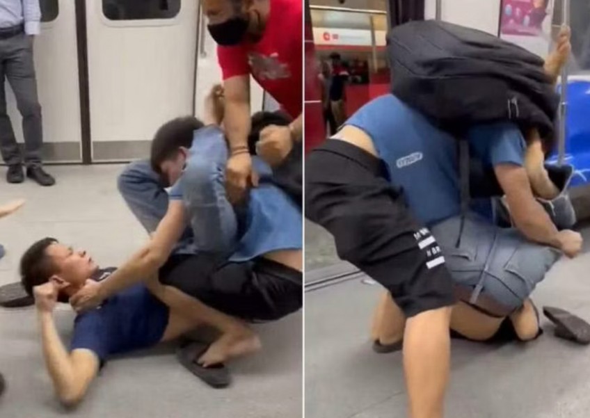 Fight train: 2 men arrested after fighting on the MRT
