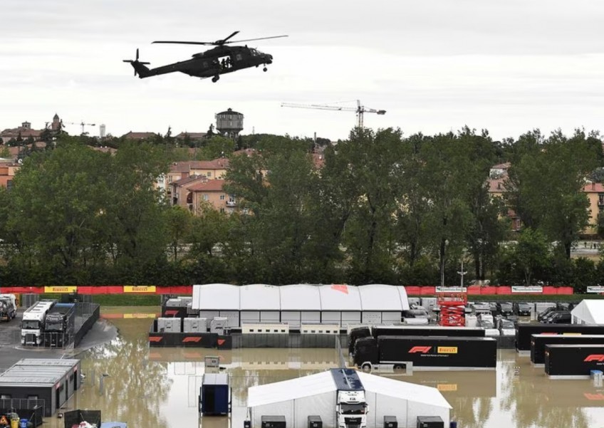 9 dead in northern Italy floods, Formula One race called off