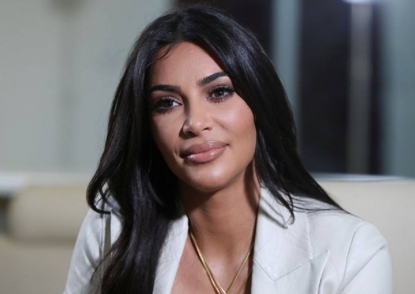 Kim Kardashian says she sometimes cries herself to sleep since becoming a mum