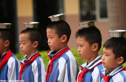 Balancing bowl on head is included in this Guangdong school's mid-term exam