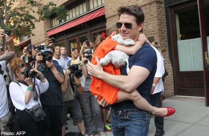 Tom Cruise denies in defamation lawsuit he ‘abandoned' daughter Suri