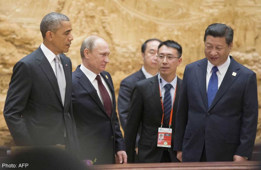 Obama and Putin are odd couple at Beijing summit