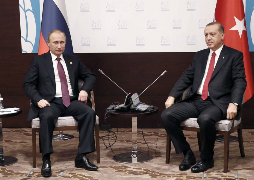 Putin snubs Turkey's Erdogan meet at Paris climate conference
