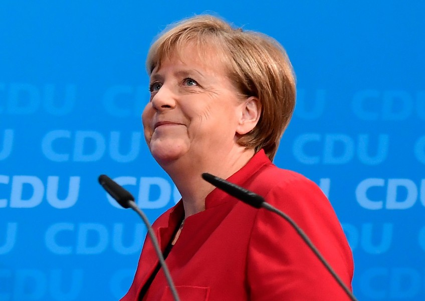 Angela Merkel says she will seek 4th term as German chancellor