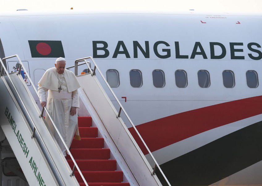 Pope lands in Bangladesh after contentious Myanmar visit 