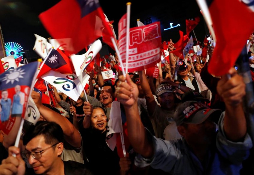 Taiwan votes in test for pro-independence ruling party as China watches