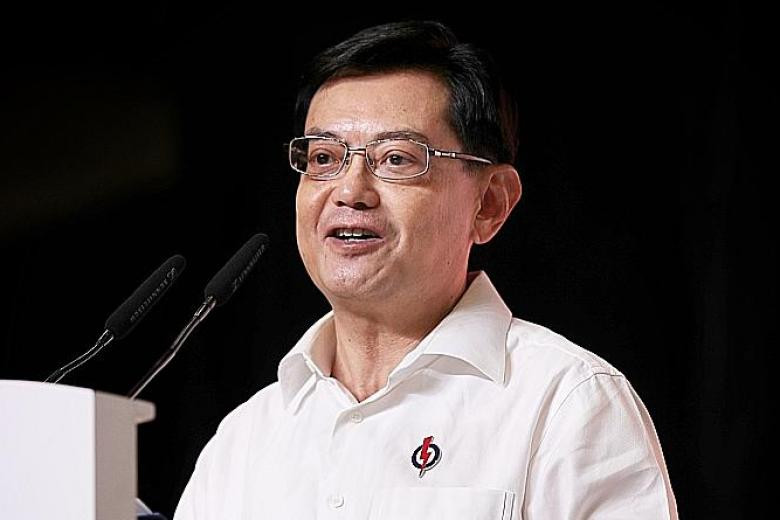 Govt upfront about GST hike - that's integrity, says Heng Swee Keat