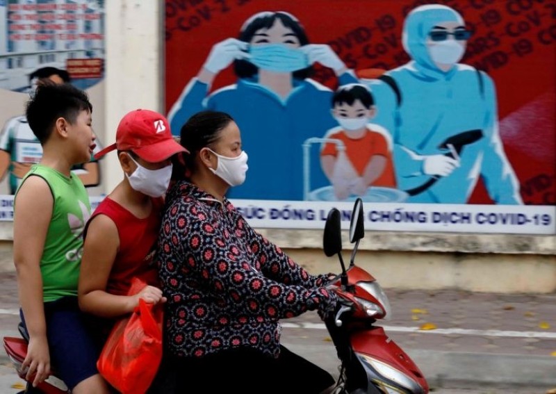 Vietnam opts for containment over 'high risk' rush for costly Covid-19 vaccine