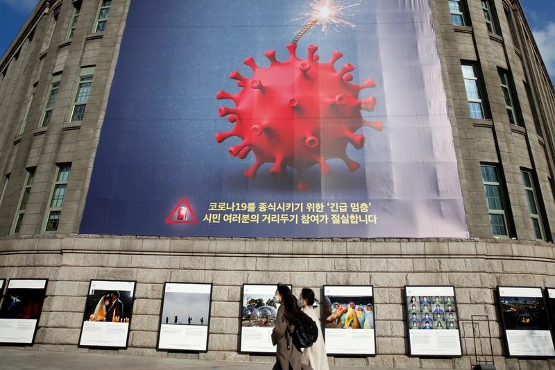 South Korea bans year-end parties, some music lessons, as virus spikes again