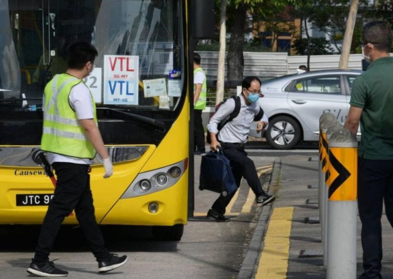 1 of only 4 passengers on first VTL bus to Singapore stopped at checkpoint