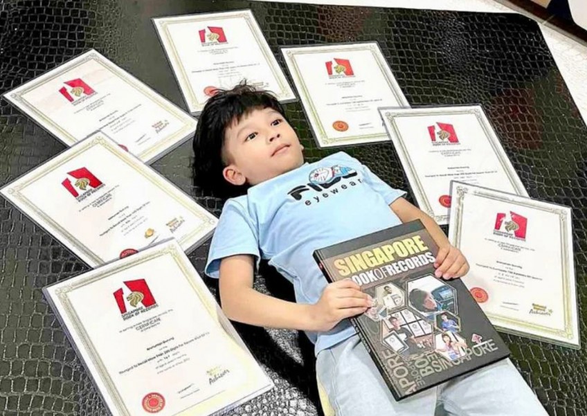6-year-old sets 7 more Singapore records: He can recite 600 decimal places and name all currencies