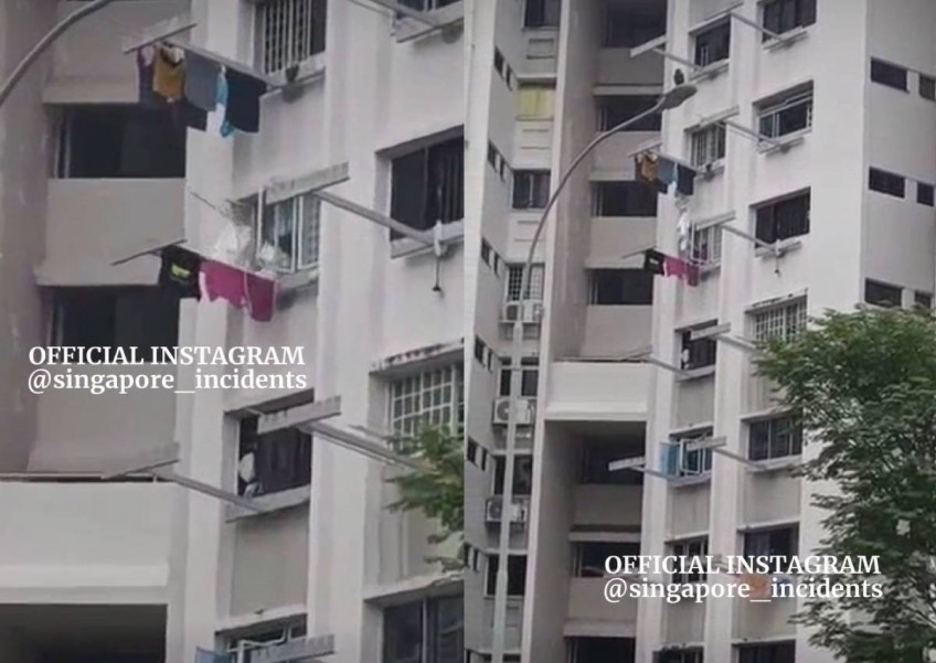 Dispute or accident? Bedok resident hits neighbour's laundry rack with bamboo pole repeatedly 