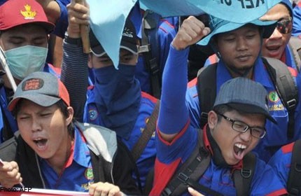 Indonesians stage nationwide strike over pay