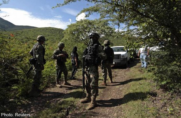 Mass graves with charred victims found in southern Mexico