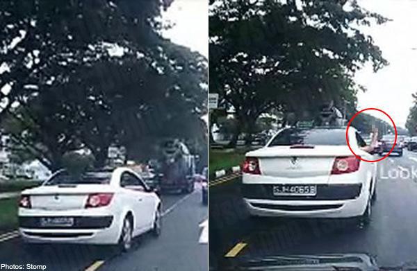 Driver shows middle finger to another after cutting into his lane