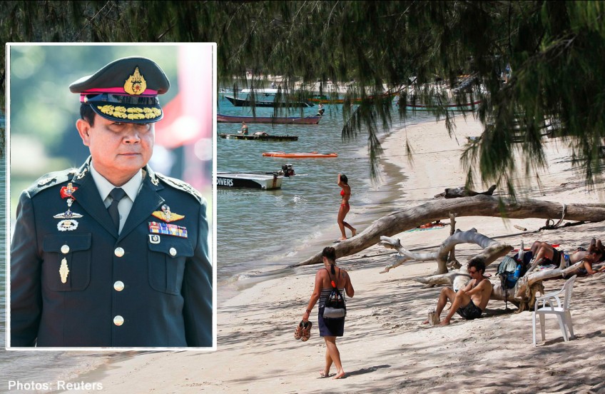 Thai PM stands by investigation into murders of British tourists