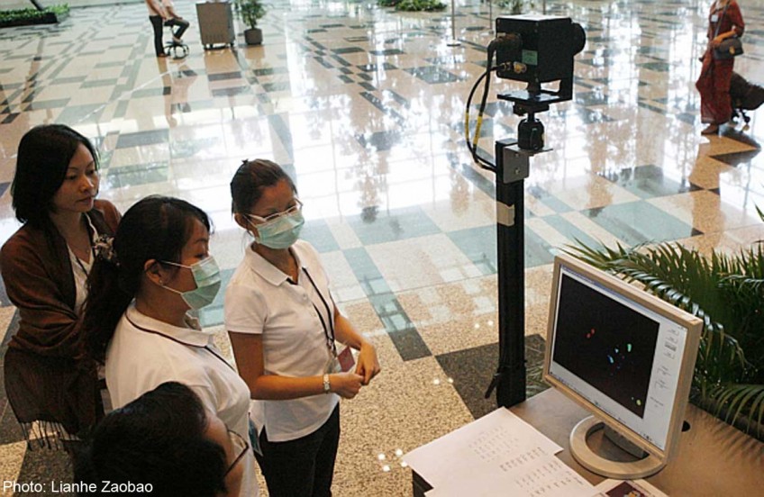 Singapore heightens Ebola screening at airport