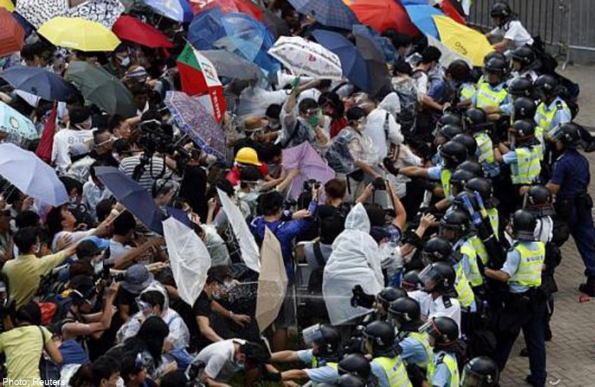 China's media slams HK rallies as an independence movement