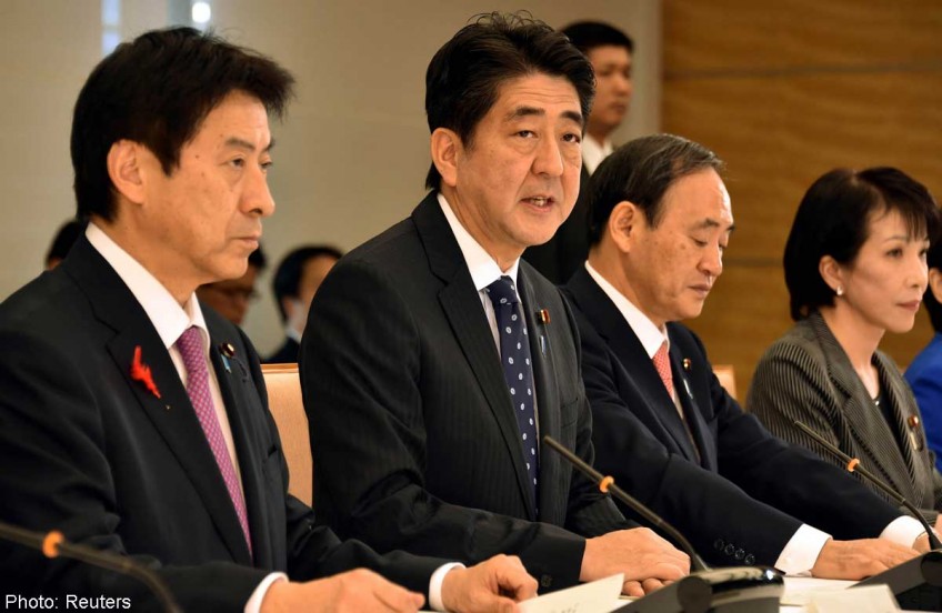 Two Japan ministers acknowledge political fund improprieties