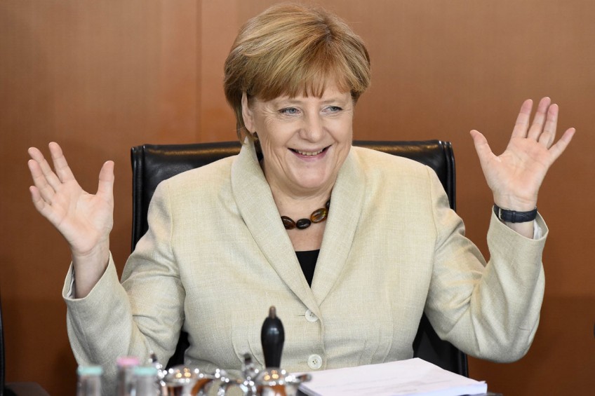 Merkel offers German investment if Ukraine tackles corruption