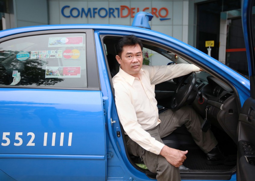 'Hero cabby' rushed to rescue man in burning car