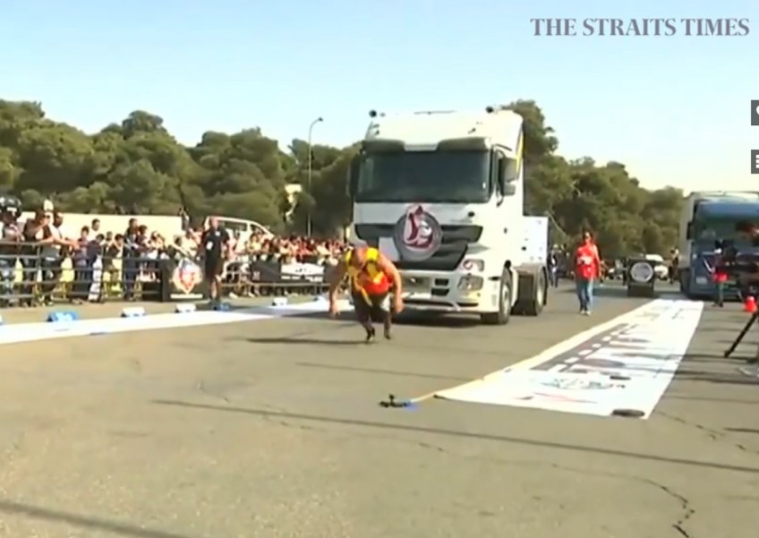 World's strongest men compete in truck-pulling contest in Jordan