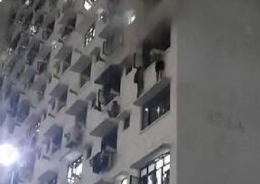 3 climb out of windows, stand on HDB ledges to escape fire in Tampines