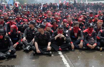 Bosses urge Jakarta not to give in as workers rally