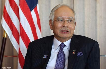 Malaysia PM 'will not rest' until MH370 answers found 