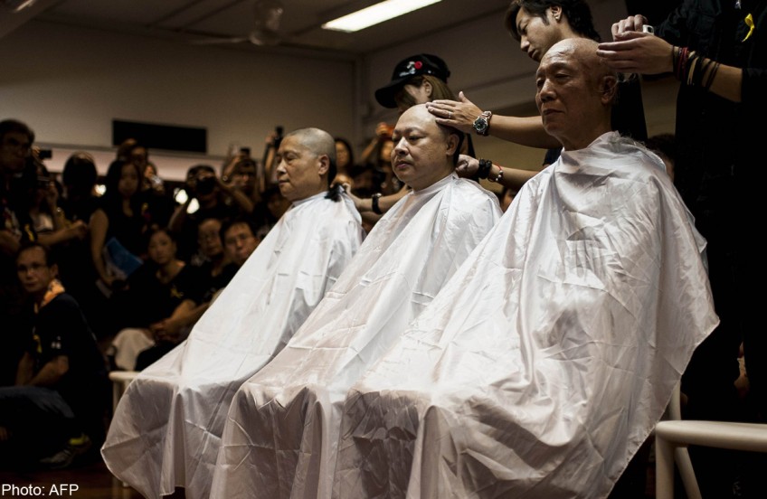 HK pro-democracy leaders shave heads in protest