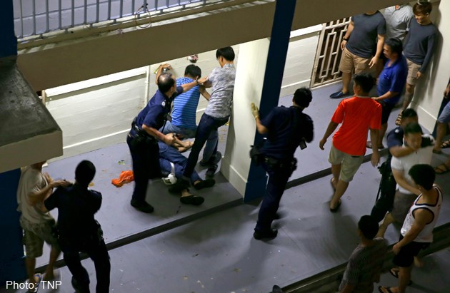 Fights erupt among more than dozen as woman lies dead at foot of Toa Payoh block