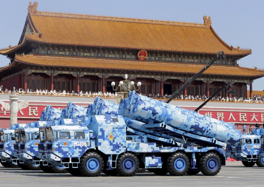 China shows new 'aircraft carrier-killer' missiles at parade