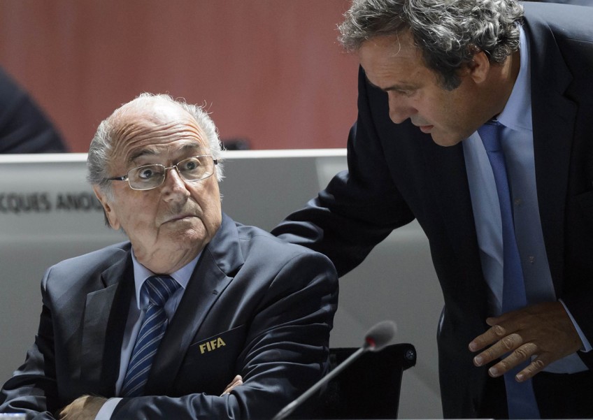 Football: Blatter, Platini risk suspension amid FIFA ethics probe